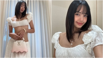 For the accessories, Lisa wore a gold bracelet, a layered chain with diamond pendants, rings, sunglasses, ballerina sandals, and a pink-and-white ombre Louis Vuitton handbag. Lastly, centre-parted loose tresses with a messy band rounded off the styling. (Instagram) For the accessories, Lisa wore a gold bracelet, a layered chain with diamond pendants, rings, sunglasses, ballerina sandals, and a pink-and-white ombre Louis Vuitton handbag. Lastly, centre-parted loose tresses with a messy band rounded off the styling. (Instagram)