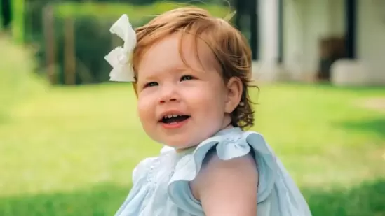 In June 2022, the Duke and Duchess of Sussex’s daughter, Lilibet Diana Mountbatten Windsor, turned one — and the family had released a sweet picture of their baby girl to celebrate. It shows Lilibet smiling on the grounds of the Sussexes’ home, Frogmore Cottage, during her birthday party. She was in a blue dress and wore a bow over her red hair.