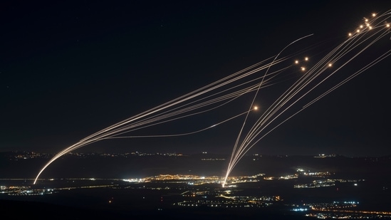 The Israeli Iron Dome air defense system fires to intercept an attack from Lebanon over the Galilee region as seen from the Israeli-annexed Golan Heights, Sunday, Aug. 4, 2024. (AP Photo/Leo Correa)