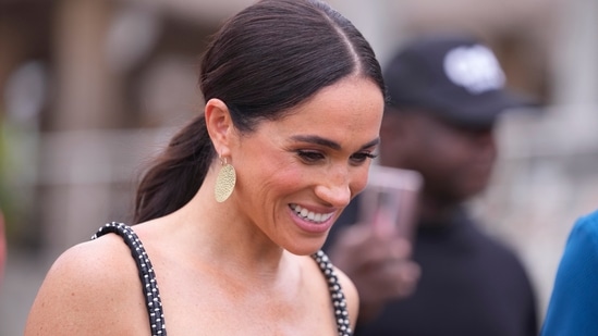 Meghan Markle wants to utilize her time to rectify her Spotify mistakes as she gears to enter the podcast industry once again. (AP Photo/Sunday Alamba)(AP)