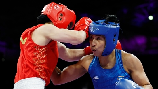 Lovlina Borgohain of India in action against Qian Li of China(REUTERS)