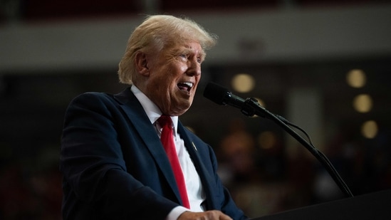 Donald Trump picked a fight with Georgia Gov. Brian Kemp the same day he rallied in the state(Getty Images via AFP)