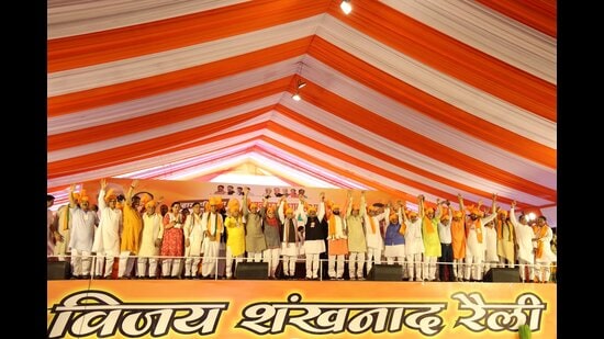 Union ministers Dharemendra Pradhan (C), Manohar Lal Khattar, Haryana CM Nayab Singh Saini and other senior party leaders during a rally in Kurukshetra on Sunday. (HT Photo)