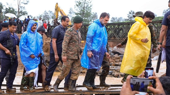 Wayanad: Leader of Opposition in Lok Sabha and Congress MP Rahul Gandhi along with party leader Priyanka Gandhi Vadra during their visit at the landslides affected sites, at Chooralmala in Wayanad.(PTI)