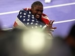 US' Noah Lyles celebrates after winning the men's 100m final of the athletics event at the Paris 2024 Olympic Games at Stade de France in Saint-Denis, north of Paris, on August 4, 2024. US' Noah Lyles celebrates after winning the men's 100m final of the athletics event at the Paris 2024 Olympic Games at Stade de France in Saint-Denis, north of Paris, on August 4, 2024.