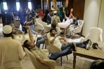 Anti-government protestors gather inside Prime Minister Sheikh Hasina's palace in Dhaka. (AFP) Anti-government protestors gather inside Prime Minister Sheikh Hasina's palace in Dhaka. (AFP)