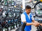 A worker organizes bicycles at a Walmart Superstore in Secaucus, New Jersey.