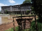 A wooden board shows the name of Treetops Lodge where Britain's Queen Elizabeth II of England stayed the night her father, the King, died and became Queen in 1952, in Aberdare Narional Park in Nyeri, Kenya, on April 10, 2021. Kenya: Historic Treetops hotel reopens after Covid, welcomes tourists once more (Photo by Yasuyoshi CHIBA / AFP)