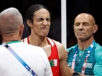 Imane Khelif of Algeria is sprayed with water ahead of her fight against Anna Luca Hamori of Hungary