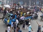 Protesters celebrate after news of Prime Minister Sheikh Hasina's resignation, in Dhaka, Bangladesh, on Monday. (AP) Protesters celebrate after news of Prime Minister Sheikh Hasina's resignation, in Dhaka, Bangladesh, on Monday. (AP)