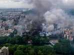 This aerial photo shows anti-government protestors set fire at Bangabandhu memorial museum at Dhanmondi locality in Dhaka on August 5, 2024. This aerial photo shows anti-government protestors set fire at Bangabandhu memorial museum at Dhanmondi locality in Dhaka on August 5, 2024.