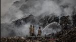 Firefighters fight a blaze at the Ghazipur landfill in Delhi on April 22. (Reuters) Firefighters fight a blaze at the Ghazipur landfill in Delhi on April 22. (Reuters)