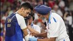 India's Lakshya Sen being given medical assistance during his men's singles bronze medal badminton match against Malaysia's Lee Zii Jia at the 2024 Summer Olympics, in Paris, on Monday. (PTI) India's Lakshya Sen being given medical assistance during his men's singles bronze medal badminton match against Malaysia's Lee Zii Jia at the 2024 Summer Olympics, in Paris, on Monday. (PTI)