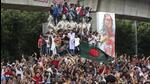 Protesters celebrate in Dhaka after Prime Minister Sheikh Hasina's resignation on Monday. (AP Photo) Protesters celebrate in Dhaka after Prime Minister Sheikh Hasina's resignation on Monday. (AP Photo)