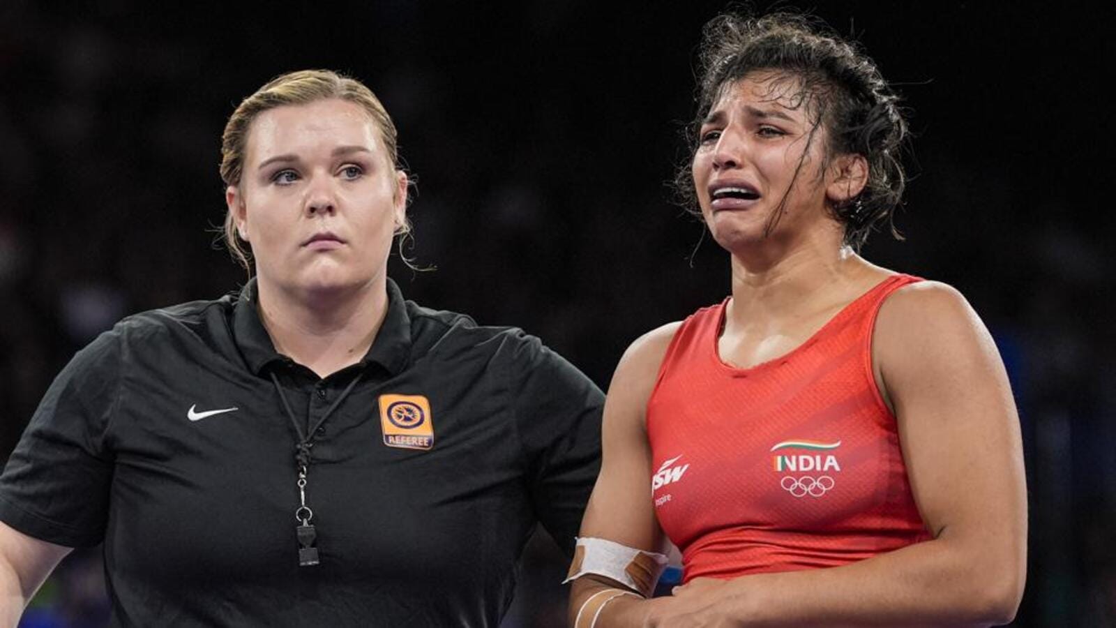 Paris 2024: Wrestler Nisha makes painful exit after shoulder injury ...