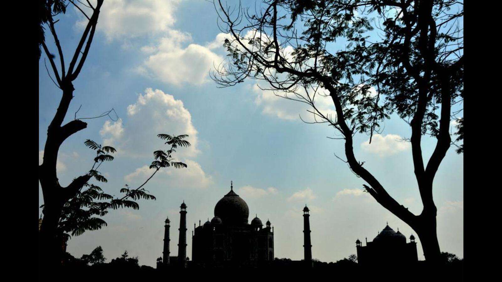 Woman held for waving saffron flag inside Taj Mahal