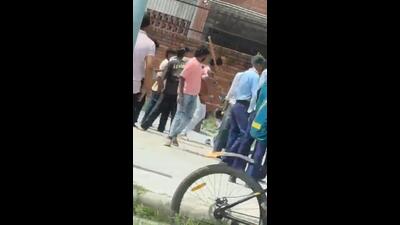 A passer-by filmed the attack on the student. (HT) A passer-by filmed the attack on the student. (HT)