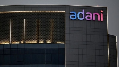 The logo of the Adani Group is seen on the facade of one of its buildings on the outskirts of Ahmedabad. (Reuters)