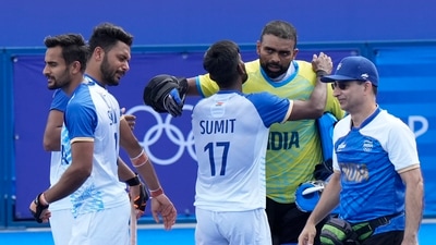 India's Harmanpreet Singh, second left, reacts as he celebrates with teammates after their win in the men's quarterfinal field hockey match against Britain (AP) India's Harmanpreet Singh, second left, reacts as he celebrates with teammates after their win in the men's quarterfinal field hockey match against Britain (AP)
