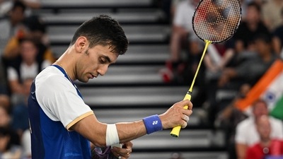 Lakshya Sen checks on his bandaged elbow. (AFP) Lakshya Sen checks on his bandaged elbow. (AFP)