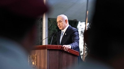 Israeli prime minister Benjamin Netanyahu speaks at the state memorial for Zeev Jabotinsky, Zionist leader and founder of the Israeli right-wing ideology, at Mount Herzl Military Cemetery in Jerusalem, on August 4, 2024. (Photo by Nama Grynbaum / POOL / AFP) Israeli prime minister Benjamin Netanyahu speaks at the state memorial for Zeev Jabotinsky, Zionist leader and founder of the Israeli right-wing ideology, at Mount Herzl Military Cemetery in Jerusalem, on August 4, 2024. (Photo by Nama Grynbaum / POOL / AFP)