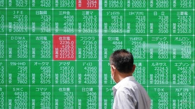 A man looks at an electronic quotation board displaying stock prices of Nikkei 225 on the Tokyo Stock Exchange in Tokyo. (AFP) A man looks at an electronic quotation board displaying stock prices of Nikkei 225 on the Tokyo Stock Exchange in Tokyo. (AFP)