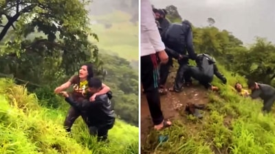 The image shows a woman being rescued after falling into a gorge in Maharashtra while allegedly taking a selfie. (Screengrab) The image shows a woman being rescued after falling into a gorge in Maharashtra while allegedly taking a selfie. (Screengrab)