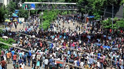 Protesters block a street in Dhaka seeking justice for the victims arrested and killed in the recent nationwide violence. (AFP Photo) Protesters block a street in Dhaka seeking justice for the victims arrested and killed in the recent nationwide violence. (AFP Photo)