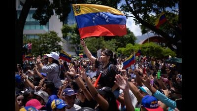 Supporters of Maria Corina Machado, Venezuela's opposition leader, not pictured, during a protest in Caracas, Venezuela, on Saturday, Aug. 3, 2024. Machado emerged from hiding on Saturday to lead a rally in Caracas, defying the government's threat to imprison her. Photographer: Gaby Oraa/Bloomberg (Bloomberg) Supporters of Maria Corina Machado, Venezuela's opposition leader, not pictured, during a protest in Caracas, Venezuela, on Saturday, Aug. 3, 2024. Machado emerged from hiding on Saturday to lead a rally in Caracas, defying the government's threat to imprison her. Photographer: Gaby Oraa/Bloomberg (Bloomberg)