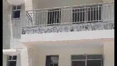 The tiles fell off from the first-floor balcony of the building when some of the allottees, who have made full payment, visited the site while taking possession of their houses. (HT Photo) The tiles fell off from the first-floor balcony of the building when some of the allottees, who have made full payment, visited the site while taking possession of their houses. (HT Photo)