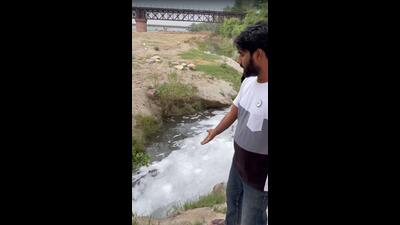 Villagers showing the polluted water mixing into the Sutlej river in Ludhiana on Monday (HT Photo) Villagers showing the polluted water mixing into the Sutlej river in Ludhiana on Monday (HT Photo)