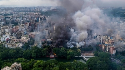 This aerial photo shows anti-government protestors set fire at Bangabandhu memorial museum at Dhanmondi locality in Dhaka on August 5, 2024. (AFP) This aerial photo shows anti-government protestors set fire at Bangabandhu memorial museum at Dhanmondi locality in Dhaka on August 5, 2024. (AFP)