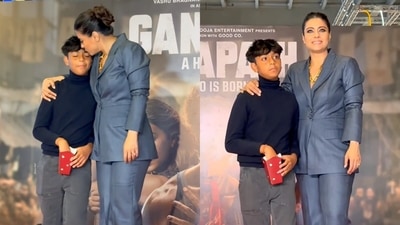 Kajol with son Yug at Ganapath screening in Mumbai. (Viral Bhayani) (Viral Bhayani) Kajol with son Yug at Ganapath screening in Mumbai. (Viral Bhayani) (Viral Bhayani)