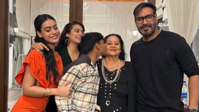 Nysa Devgan, Kajol, Yug, Veena and Ajay Devgn pose for a photo. Nysa Devgan, Kajol, Yug, Veena and Ajay Devgn pose for a photo.