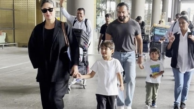 Kareena Kapoor and her family enjoyed a long summer break, and she made a stylish statement at the airport in an all-black ensemble. Her outfit featured a checkered pantsuit, paired with black sunglasses and a chic handbag, radiating effortless elegance. (HT photo/VarinderChawla) Kareena Kapoor and her family enjoyed a long summer break, and she made a stylish statement at the airport in an all-black ensemble. Her outfit featured a checkered pantsuit, paired with black sunglasses and a chic handbag, radiating effortless elegance. (HT photo/VarinderChawla)