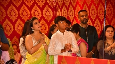 Kajol and son Yug spotted praying to Godess Durga at the North Bombay Durga Puja. She makes sure to attend the annual celebrations every year with her mother Tanuja and sister Tanishaa. Kajol and son Yug spotted praying to Godess Durga at the North Bombay Durga Puja. She makes sure to attend the annual celebrations every year with her mother Tanuja and sister Tanishaa. 