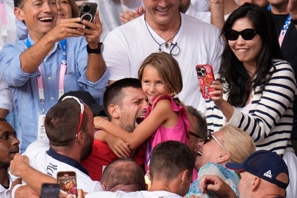Serbia's Novak Djokovic embraces his daughter Tara after defeating Spain's Carlos Alcaraz (AP) Serbia's Novak Djokovic embraces his daughter Tara after defeating Spain's Carlos Alcaraz (AP)