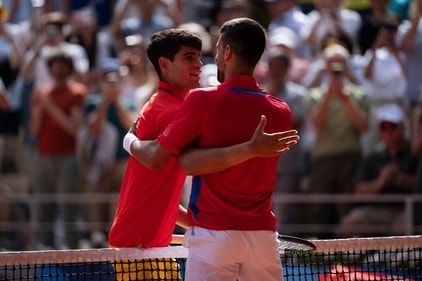 Serbia's Novak Djokovic and Spain's Carlos Alcaraz great each other after the men's singles tennis final at the Roland Garros (AP) Serbia's Novak Djokovic and Spain's Carlos Alcaraz great each other after the men's singles tennis final at the Roland Garros (AP)