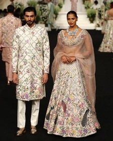 Floral lehengas and sherwanis were seen at Rahul Mishra's show at India Couture Week 2024 (Photo: Instagram)