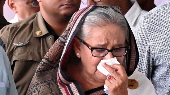 Bangladesh Prime Minister Sheikh Hasina weeps while she visits a metro station in Mirpur vandalised by students during the anti-quota protests.(AFP file)