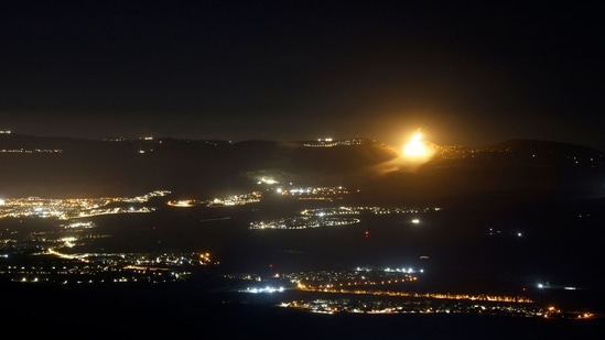 Israel Iran News LIVE: Flares of the Israeli army light up the sky of the area bordering Lebanon on August 3, 2024, amid ongoing cross-border clashes between Israeli troops and Lebanon's Hezbollah fighters. 