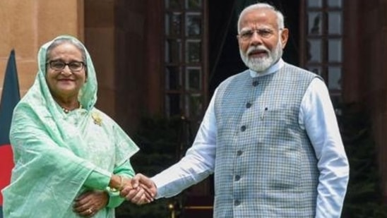 India's Prime Minister Narendra Modi with his Bangladesh's counterpart Sheikh Hasina (L) in New Delhi. (PTI file)