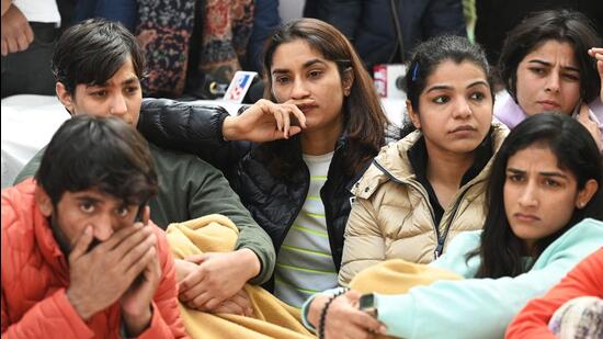 Wrestlers Bajrang Punia, Anshu Malik, Vinesh Phogat and Sakshi Malik along with others during the sit-in protest, in January. (AFP)