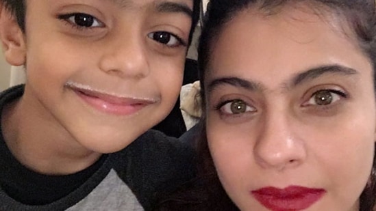 In the picture, Yug is seen sporting a milk moustache, and Kajol looks ready for a photoshoot.