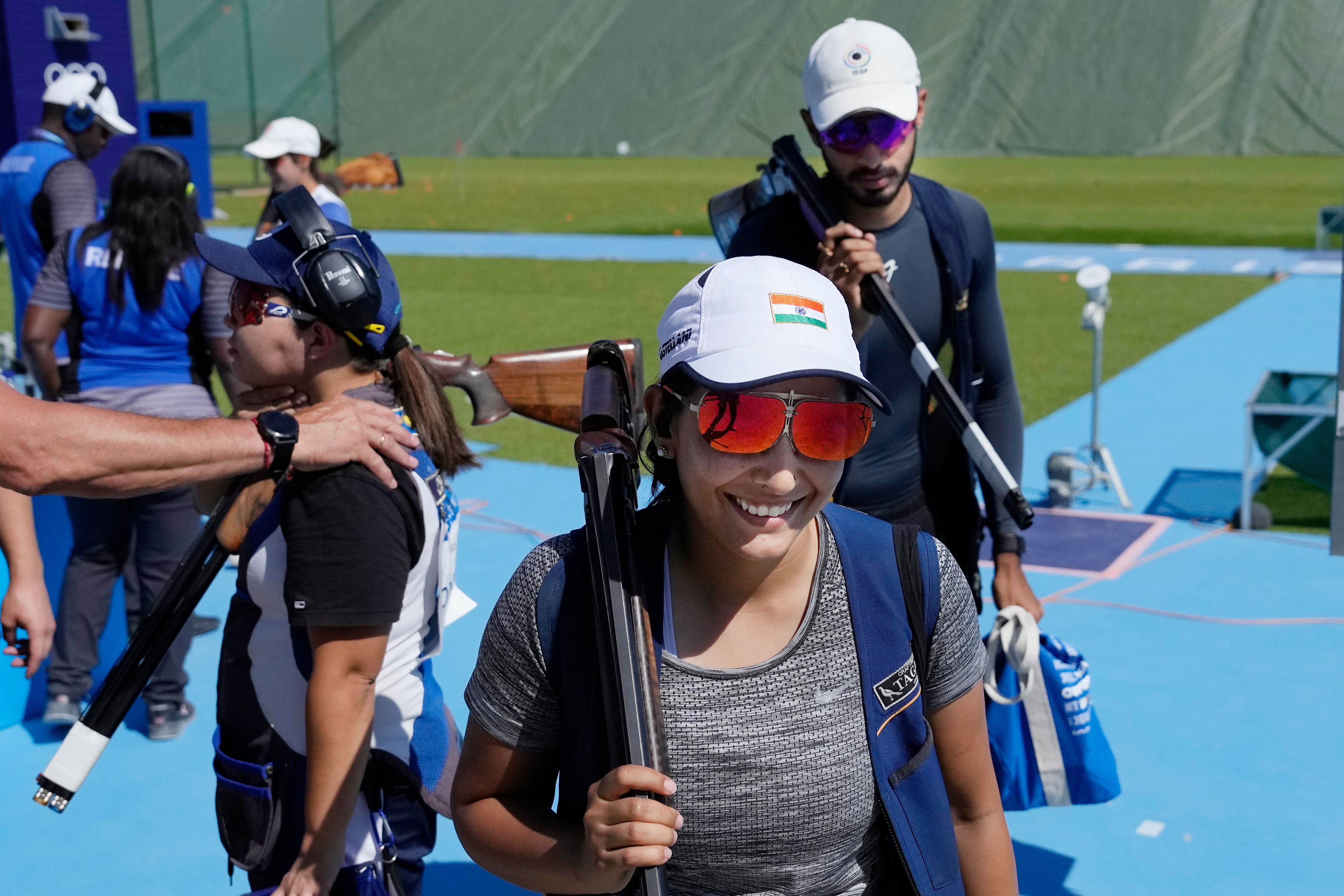 India's Maheshwari Chauhan(center), and Anant Jeet Singh Naruka (center right) (AP) India's Maheshwari Chauhan(center), and Anant Jeet Singh Naruka (center right) (AP)