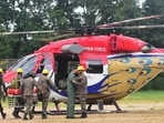 An IAF helicopter along with the Indian Army conducting rescue operation following landslides that led to massive damage in Wayanad district. (PTI) An IAF helicopter along with the Indian Army conducting rescue operation following landslides that led to massive damage in Wayanad district. (PTI)