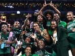 Nigeria's players and Nigeria's US coach Rena Wakama (Front 2ndR) pose as they celebrate after winning the women's preliminary round group B basketball match between Canada and Nigeria during the Paris 2024 Olympic Games at the Pierre-Mauroy stadium in Villeneuve-d'Ascq, northern France, on August 4, 2024. (Photo by Sameer AL-DOUMY / AFP) Nigeria's players and Nigeria's US coach Rena Wakama (Front 2ndR) pose as they celebrate after winning the women's preliminary round group B basketball match between Canada and Nigeria during the Paris 2024 Olympic Games at the Pierre-Mauroy stadium in Villeneuve-d'Ascq, northern France, on August 4, 2024. (Photo by Sameer AL-DOUMY / AFP)