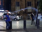 Protestors throw fireworks as the riots continue into the night in Liverpool, Britain, August 3, 2024. REUTERS/ Belinda Jiao
