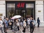 Pedestrians walk past an H&M store on Nanjing Road in Shanghai, China, on Saturday, July 27, 2024 (Qilai Shen/Bloomberg) Pedestrians walk past an H&M store on Nanjing Road in Shanghai, China, on Saturday, July 27, 2024 (Qilai Shen/Bloomberg)