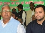 Former railway minister Lalu Prasad Yadav and former Bihar deputy chief minister Tejashwi Yadav were named in the charge sheet filed by ED in in the money laundering case related to the alleged land-for-jobs scam (PTI) Former railway minister Lalu Prasad Yadav and former Bihar deputy chief minister Tejashwi Yadav were named in the charge sheet filed by ED in in the money laundering case related to the alleged land-for-jobs scam (PTI)